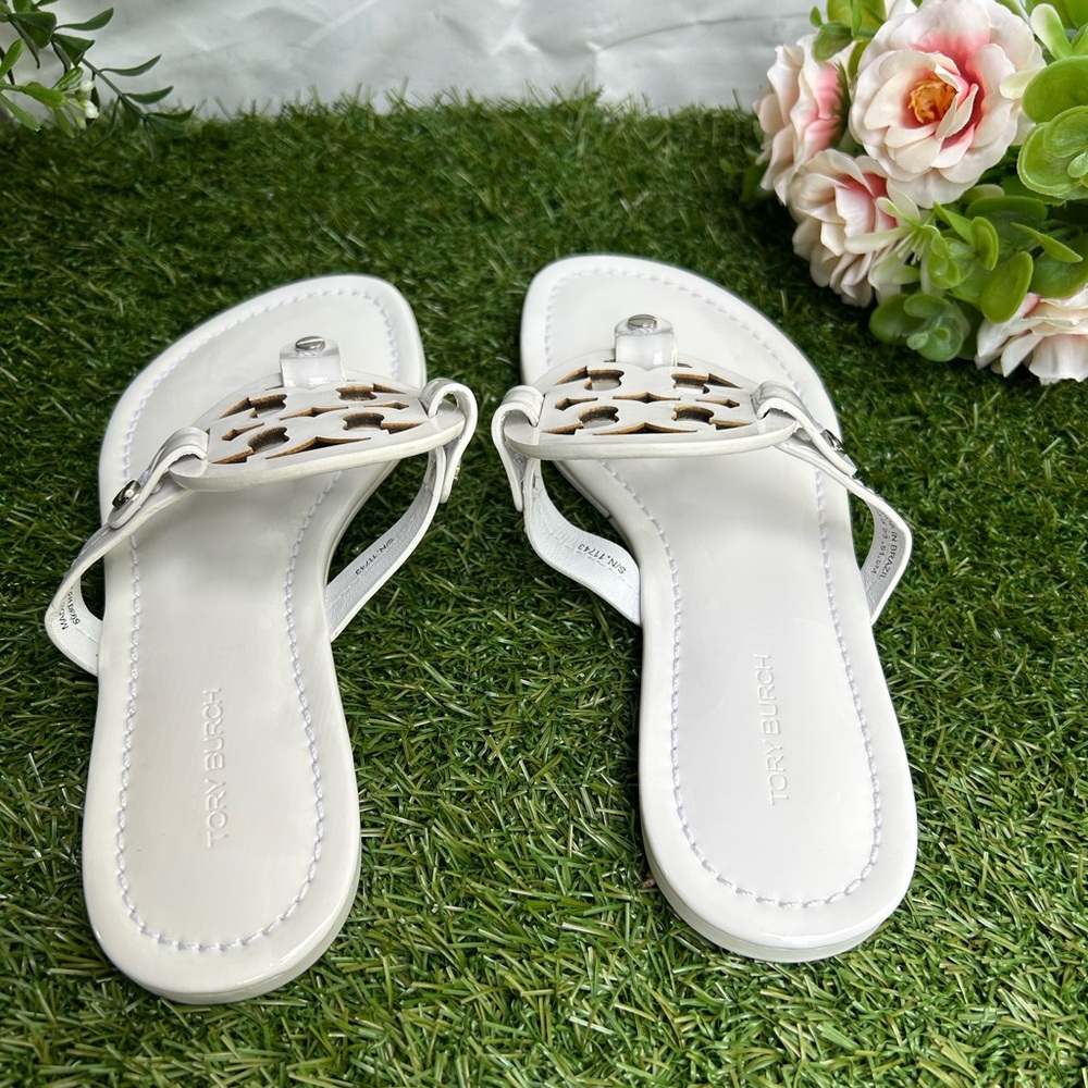 Tory Burch 
Miller cut-out leather flip-flops
$267 Sandals Sz 59 optical white - Picture 11 of 16
